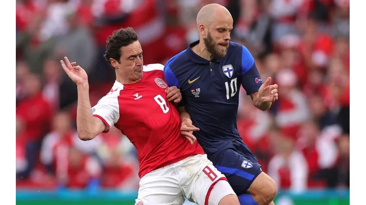 Thomas Delaney of Denmark and Teemu Pukki of Finland