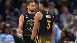 Stephen Curry #30 and Jordan Poole #3 of the Golden State Warriors