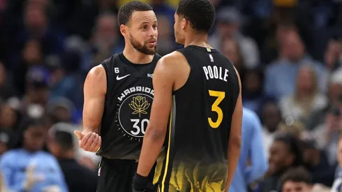 Stephen Curry #30 and Jordan Poole #3 of the Golden State Warriors