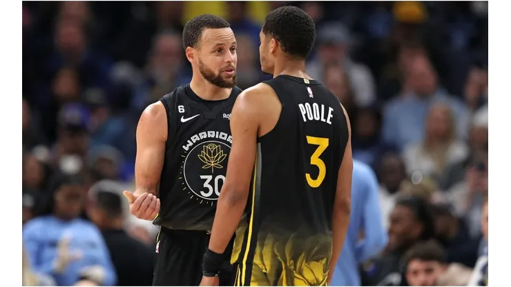 Stephen Curry #30 and Jordan Poole #3 of the Golden State Warriors
