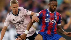 Oleksandr Zinchenko of Arsenal and Jordan Ayew of Crystal Palace