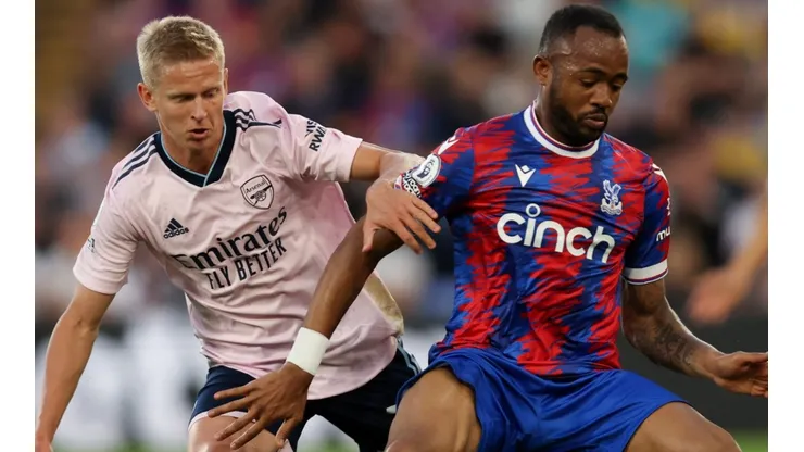 Oleksandr Zinchenko of Arsenal and Jordan Ayew of Crystal Palace