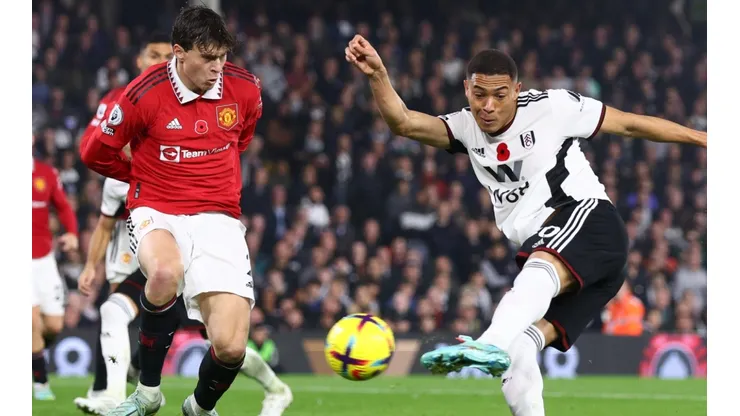 Victor Lindelof of Manchester United and Carlos Vinicius of Fulham