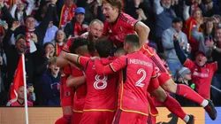 Klauss #9 and Tim Parker #26 of St. Louis City celebrate with teammates