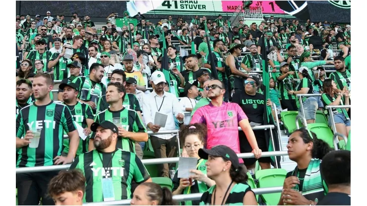 Fans attend a game