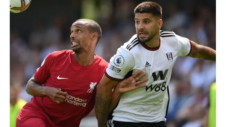 Joel Matip of Liverpool and Aleksandar Mitrovic of Fulham
