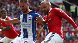 Alexis Mac Allister of Brighton and Luke Shaw of Manchester United