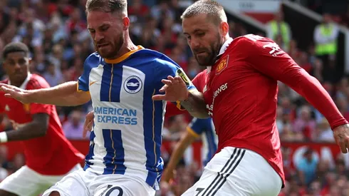 Alexis Mac Allister of Brighton and Luke Shaw of Manchester United