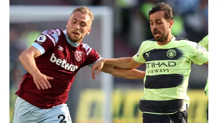 Jarrod Bowen of West Ham and Bernardo Silva of Manchester City