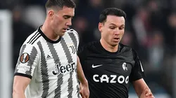 Dusan Vlahovic of Juventus and Nicolas Hoefler of Freiburg