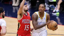 Lonnie Walker IV #4 of the Los Angeles Lakers drives against Jose Alvarado #15 of the New Orleans Pelicans
