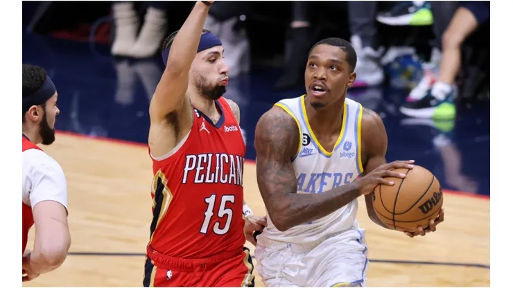 Lonnie Walker IV #4 of the Los Angeles Lakers drives against Jose Alvarado #15 of the New Orleans Pelicans