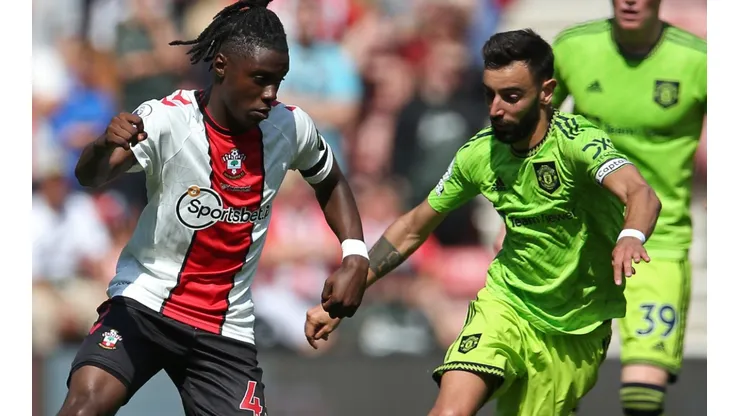 Romeo Lavia of Southampton and Bruno Fernandes of Manchester United