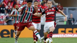 German Cano of Fluminense competes for the ball with Filipe Luis of Flamengo