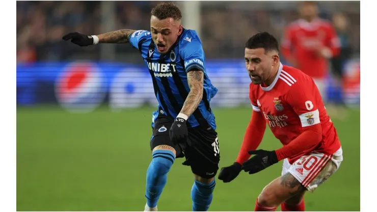 Noa Lang of Club Brugge is tackled by Nicolas Otamendi of Benfica