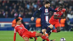 Lionel Messi of Paris Saint-Germain is challenged by Jamal Musiala and is marked by Dayot Upamecano of FC Bayern Munich