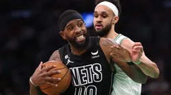 Royce O'Neale of the Brooklyn Nets and Derrick White of the Boston Celtics