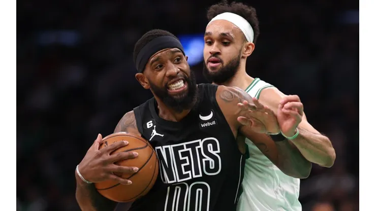 Royce O'Neale of the Brooklyn Nets and Derrick White of the Boston Celtics