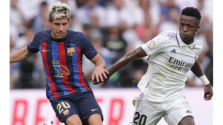 Sergi Roberto of Barcelona and Vinicius of Real Madrid