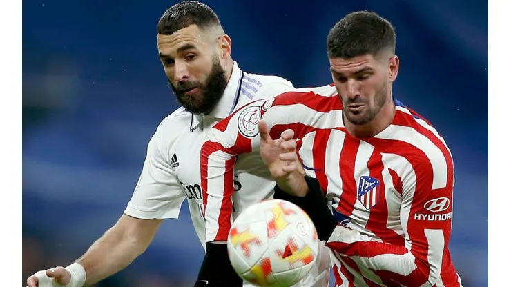 Karim Benzema of Real Madrid and Rodrigo de Paul of Atletico Madrid