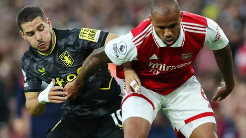 Emi Buendia of Aston Villa and Gabriel Magalhaes of Arsenal