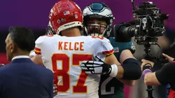 Jason and Travis Kelce hug each other after the Super Bowl LVII.