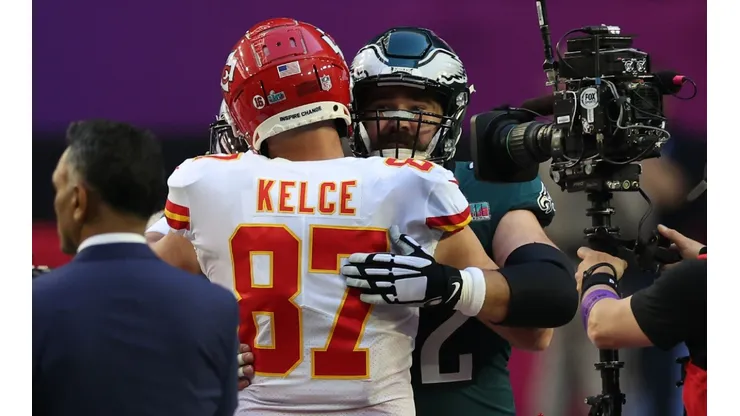 Jason and Travis Kelce hug each other after the Super Bowl LVII.