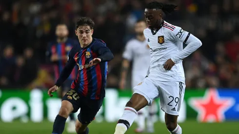 Gavi of FC Barcelona battles for possession with Aaron Wan-Bissaka of Manchester United