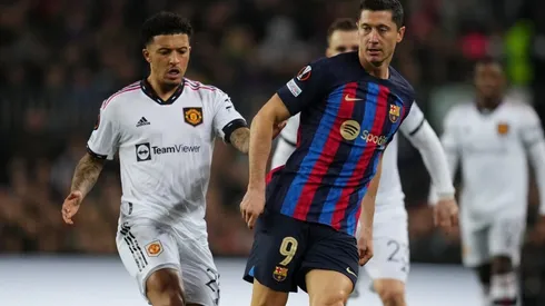 Jadon Sancho of Manchester United (left) and Robert Lewandowski of FC Barcelona.