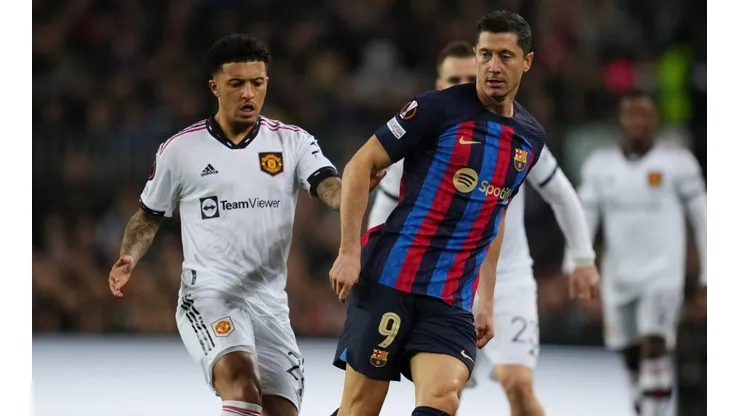 Jadon Sancho of Manchester United (left) and Robert Lewandowski of FC Barcelona.