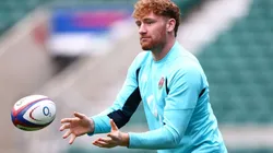 England Captain's Ollie Chessum passes the ball during a training session