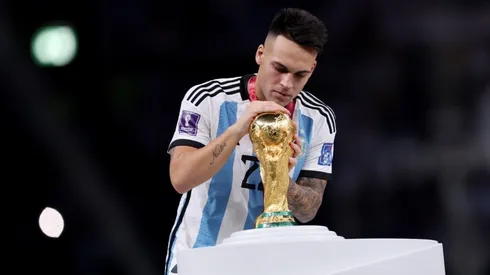 Lautaro Martinez with the World Cup trophy in Qatar