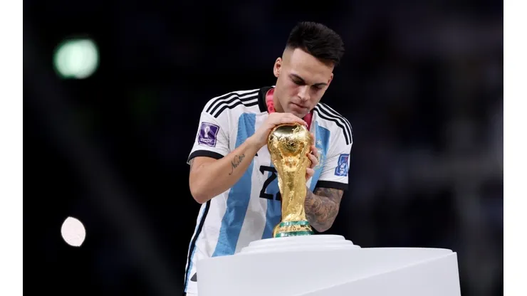 Lautaro Martinez with the World Cup trophy in Qatar