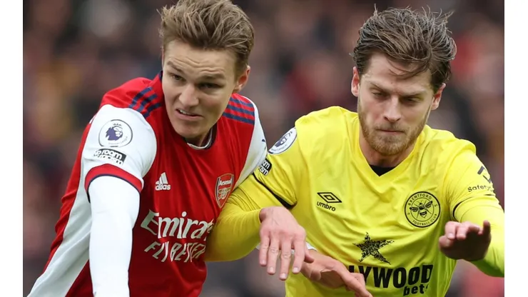 Martin Odegaard of Arsenal and Mathias Jensen of Brentford