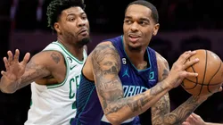 Marcus Smart of the Boston Celtics and J. Washington of the Charlotte Hornets