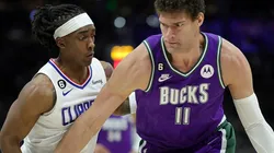 Terance Mann of the LA Clippers and Brook Lopez of the Milwaukee Bucks