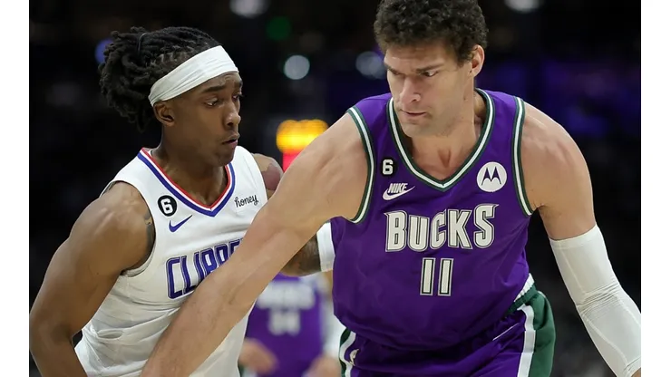 Terance Mann of the LA Clippers and Brook Lopez of the Milwaukee Bucks