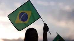 Fans wave a Brazil flag