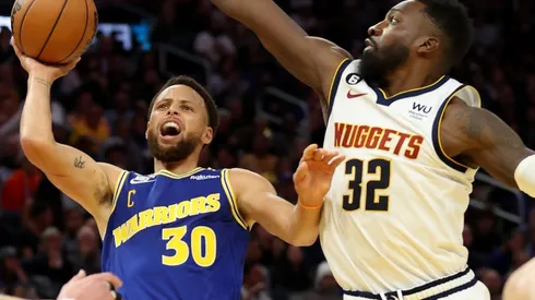 Stephen Curry of the Golden State Warriors and Jeff Green of the Denver Nuggets