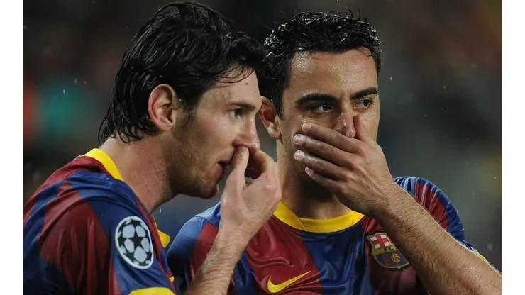 Lionel Messi and Xavi Hernandez