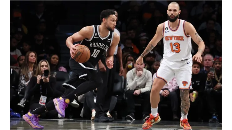 Ben Simmons #10 of the Brooklyn Nets drives against Evan Fournier #13 of the New York Knicks