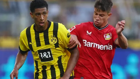 Jude Bellingham of Borussia Dortmund and Adam Hlozek of Bayer Leverkusen