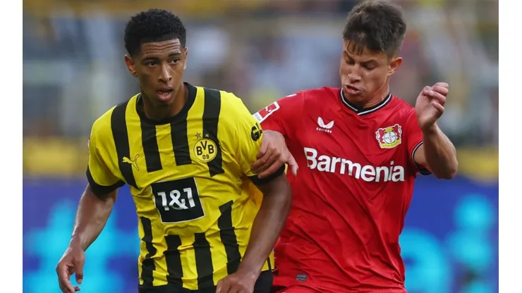 Jude Bellingham of Borussia Dortmund and Adam Hlozek of Bayer Leverkusen