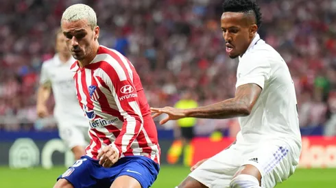 Antoine Griezmann of Atletico Madrid and Eder Militao of Real Madrid