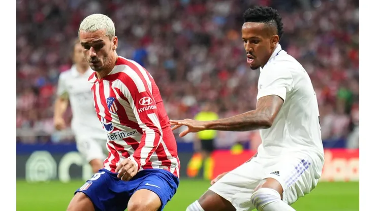 Antoine Griezmann of Atletico Madrid and Eder Militao of Real Madrid