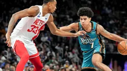 Nic Claxton of the Brooklyn Nets and Killian Hayes of the Detroit Pistons