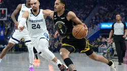 Jordan Poole #3 of the Golden State Warriors drives to the basket past Dillon Brooks #24 of the Memphis Grizzlies