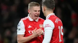 Oleksandr Zinchenko celebrates with Leandro Trossard of Arsenal