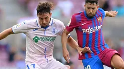 Jaime Mata of Getafe and Jordi Alba of Barcelona