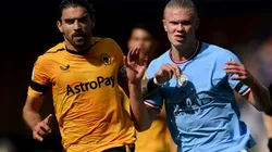 Ruben Neves of Wolves and Erling Haaland of Manchester City
